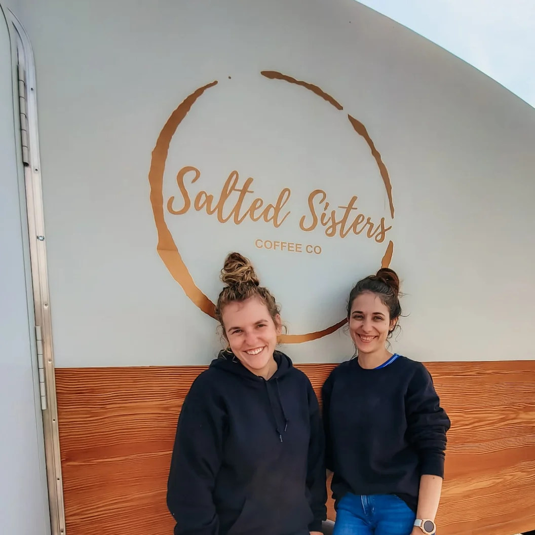 A sister making a drink behind the Salted Sisters counter